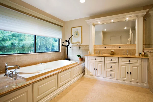 Freestanding soaking tub installation in a modern Long Island bathroom renovation